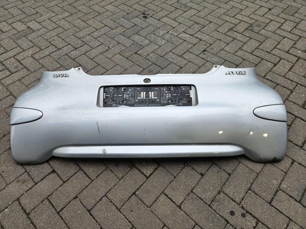 ACHTERBUMPER TOYOTA AYGO GRIJS, Niet ingevuld, Gebruikt, Niet ingevuld, Ophalen of Verzenden