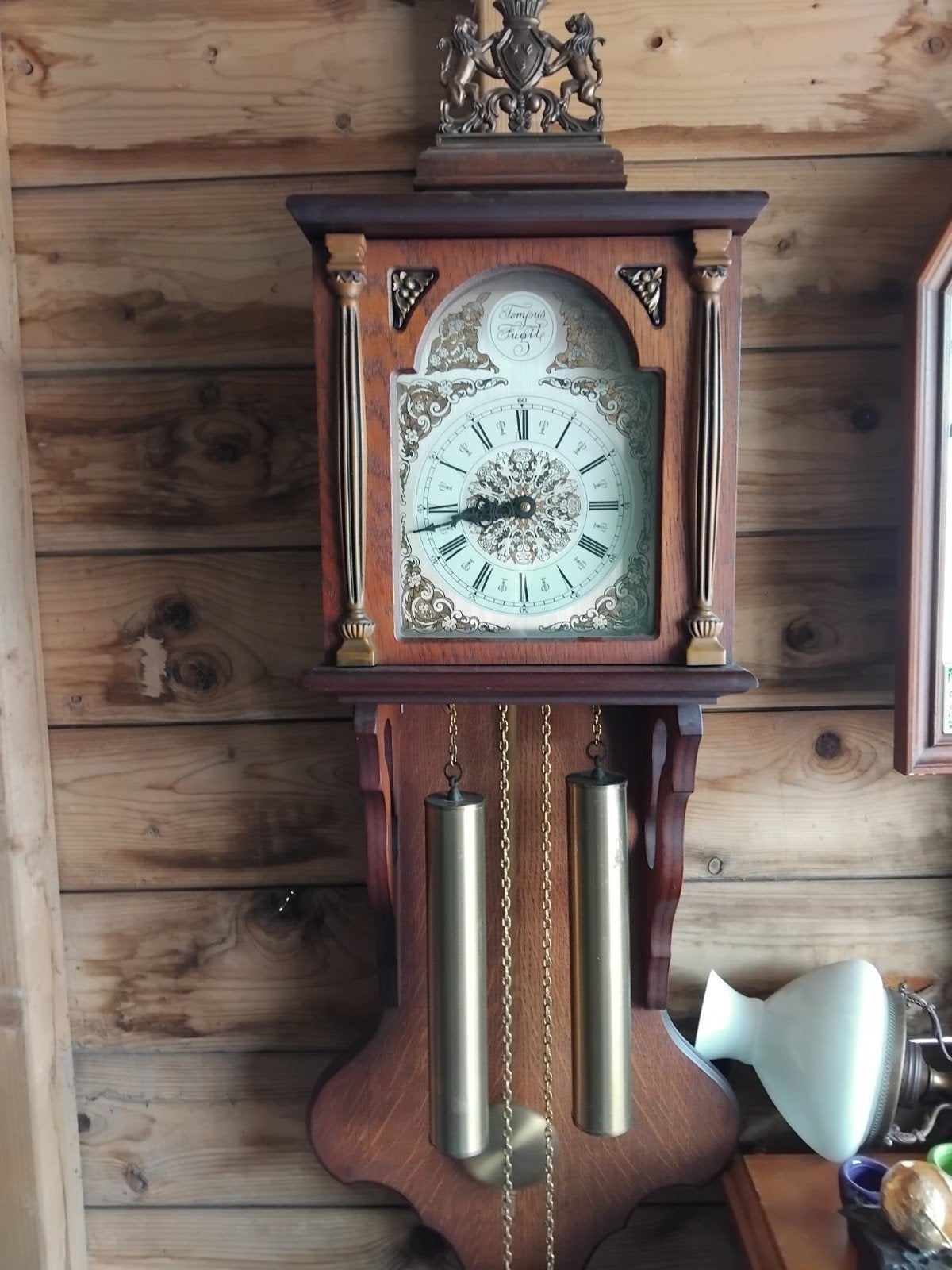 Tempus fugit wandklok, Ophalen