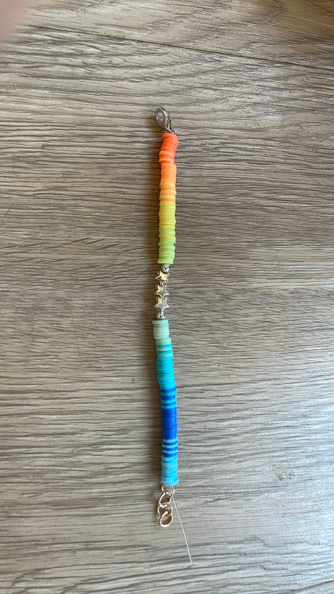 Regenboog armbandje met sterren, Overige kleuren, Verzenden, Kunststof of Plastic, Zo goed als nieuw