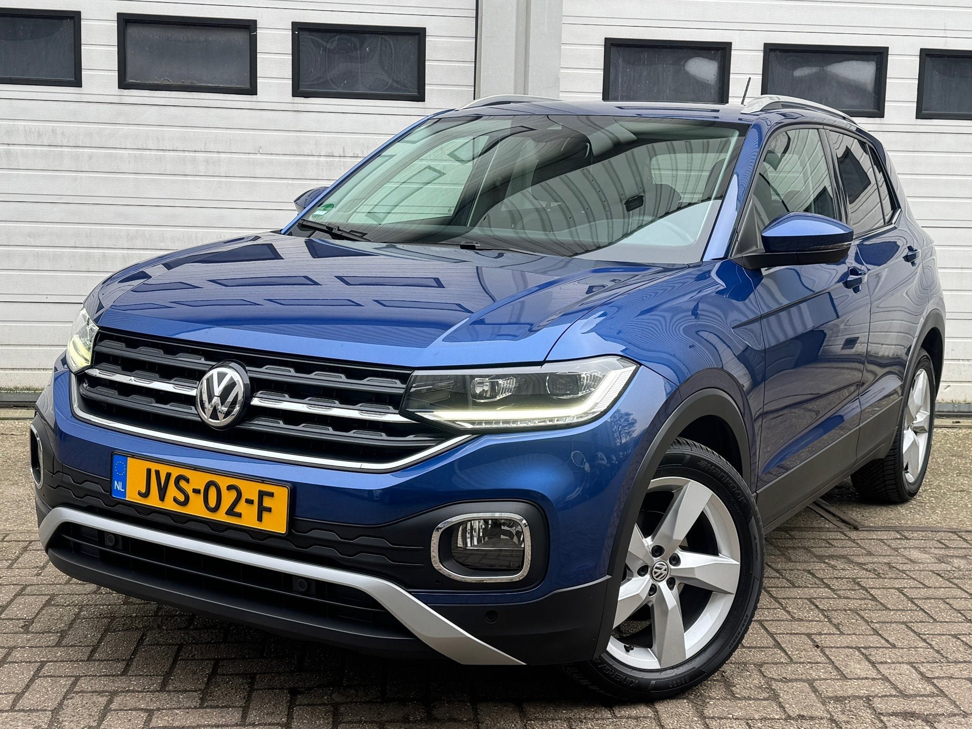 Volkswagen T-Cross 1.0 TSI Style automaat/xenon/led/front as, Auto's, T-Cross, Gebruikt, Blauw, Bedrijf