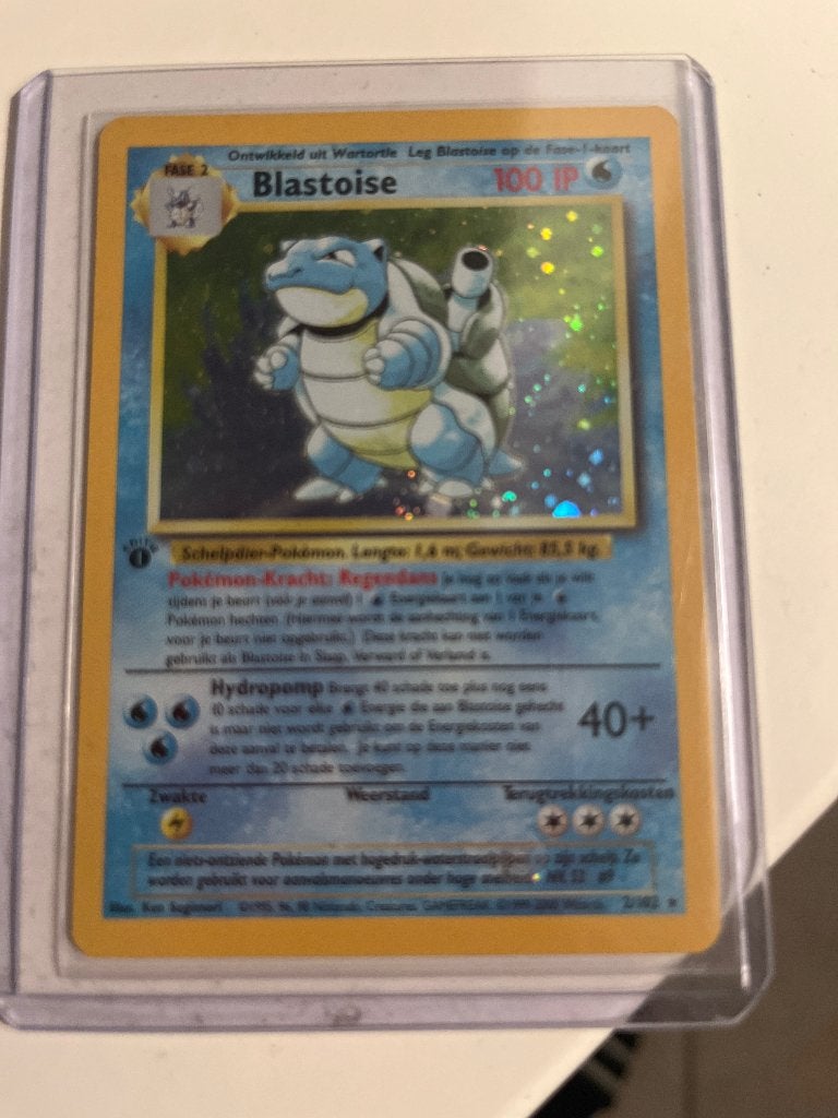 Blastoise first edition nl 1999, Ophalen of Verzenden, Zo goed als nieuw, Losse kaart, Foil
