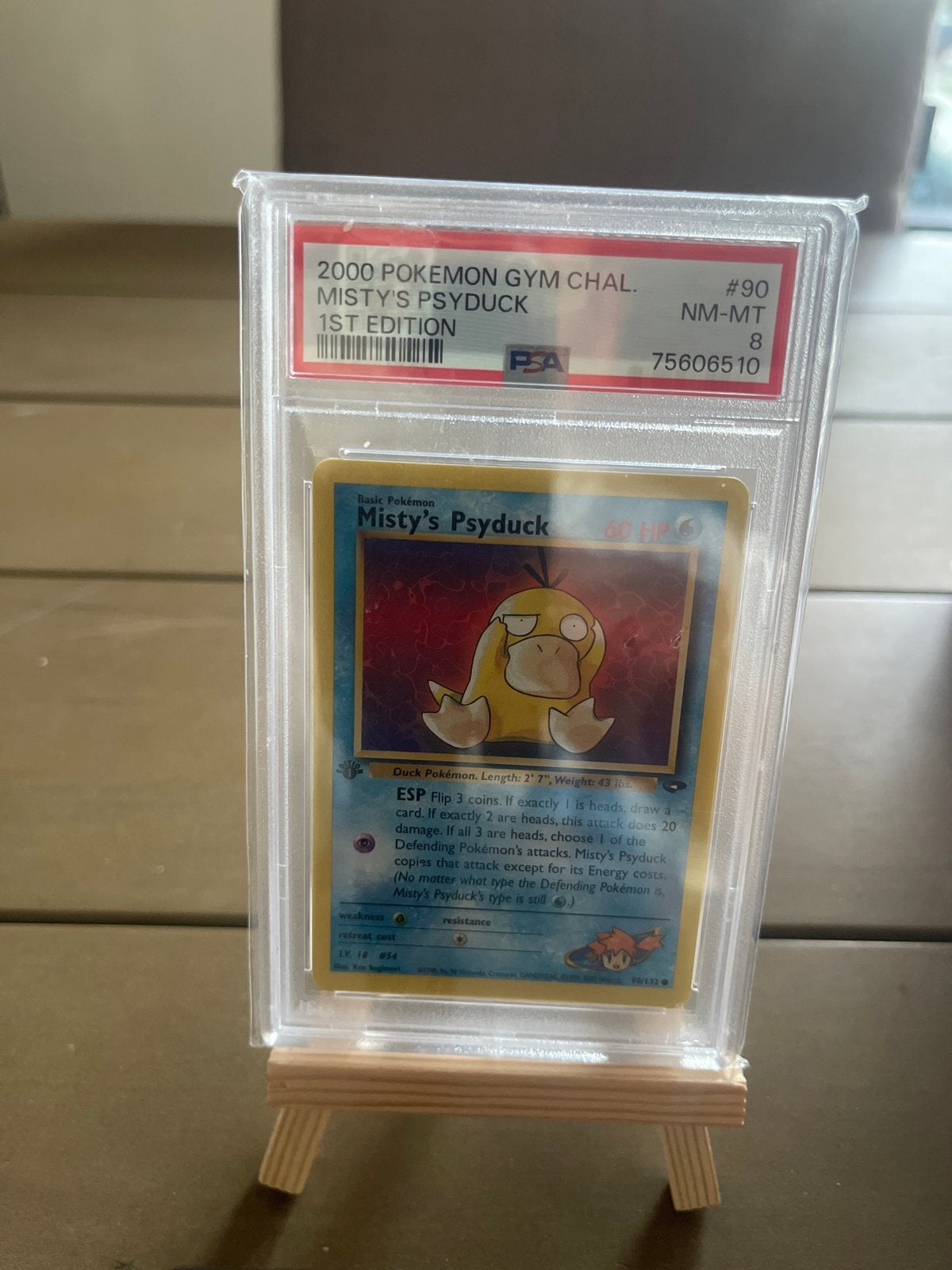 Misty's Psyduck 1st Edition PSA 8 NM-MT Pokémon Kaart, Ophalen of Verzenden, Zo goed als nieuw, Losse kaart