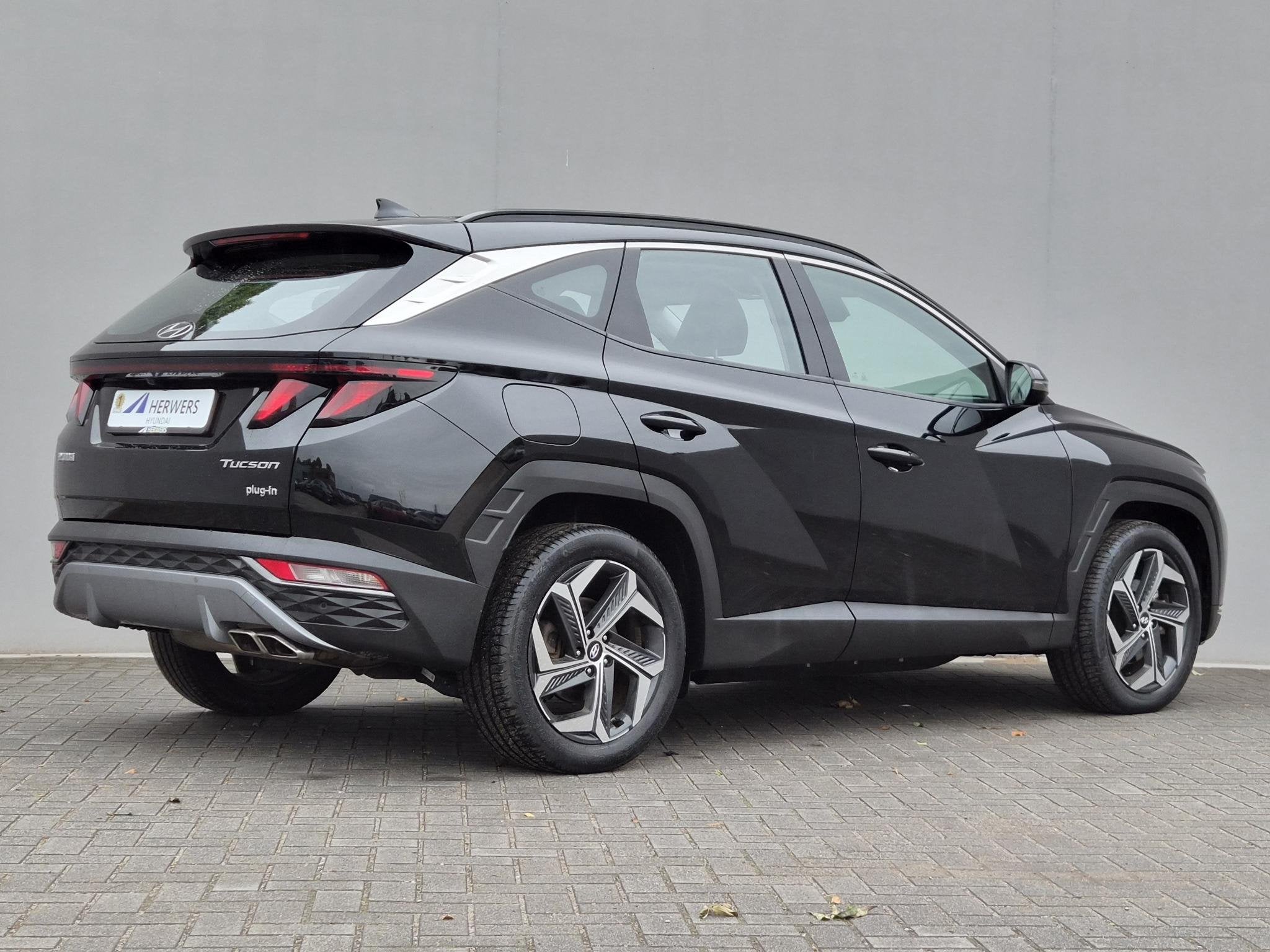 Hyundai Tucson 1.6 T-GDI PHEV Comfort 4WD / SOH 98% / Fabrie, Auto's, Automaat, Gebruikt, 4 cilinders, Zwart