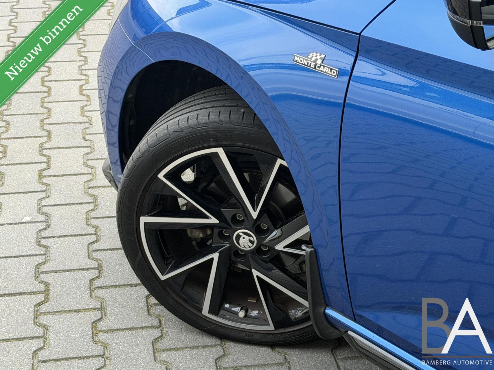 Skoda Scala 1.0 TSI DSG Monte Carlo Pano|carplay|trekhaak, Auto's, Dealer onderhouden, Gebruikt, Zwart, 1232 kg