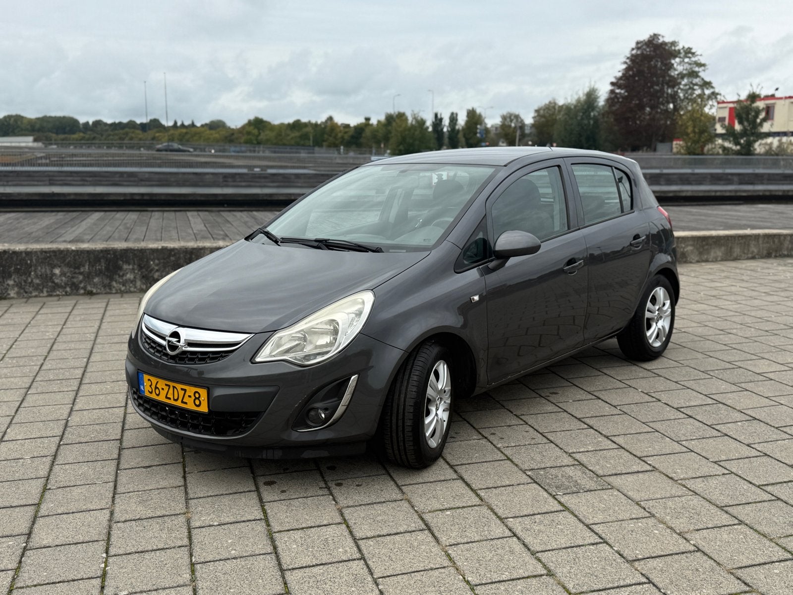 Opel Corsa 1.4 16V 5D 2012 Grijs, Voorwielaandrijving, 1063 kg, 4 cilinders, 100 pk