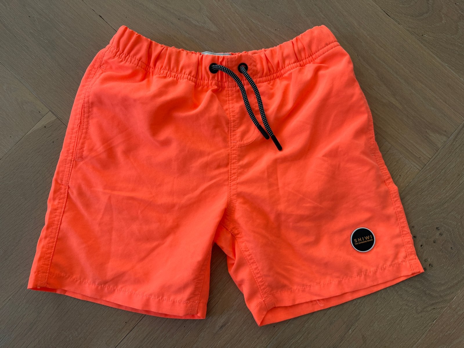 Neon Oranje Shiwi Zwembroek Maat 134/140, Ophalen of Verzenden, Zo goed als nieuw, Zwembroek, Jongen