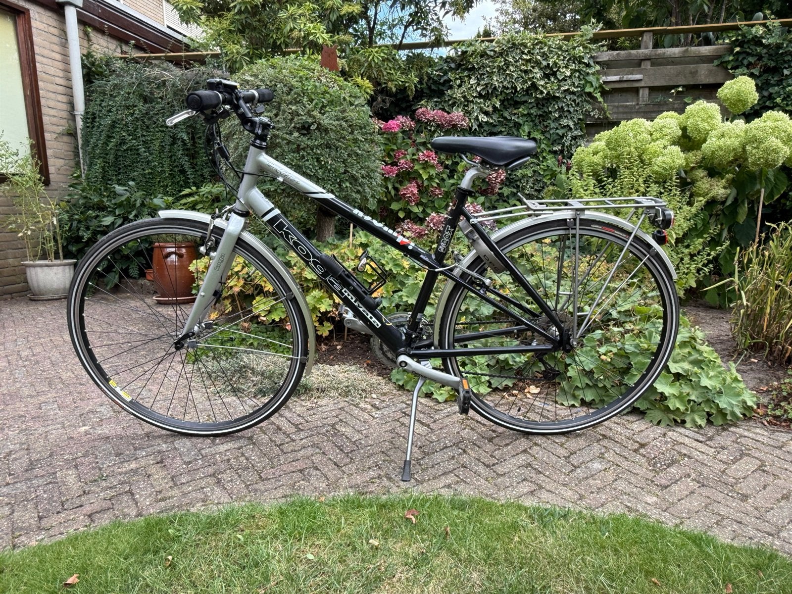 Koga Miyata hybride damesfiets in nieuwstaat., Ophalen, 28 inch, Velgrem, Zo goed als nieuw