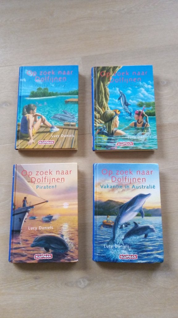 4 boeken over dolfijnen en mensen., Boeken, Ophalen of Verzenden, Gelezen, Fictie