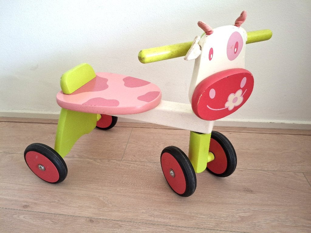 Houten loopfietsje