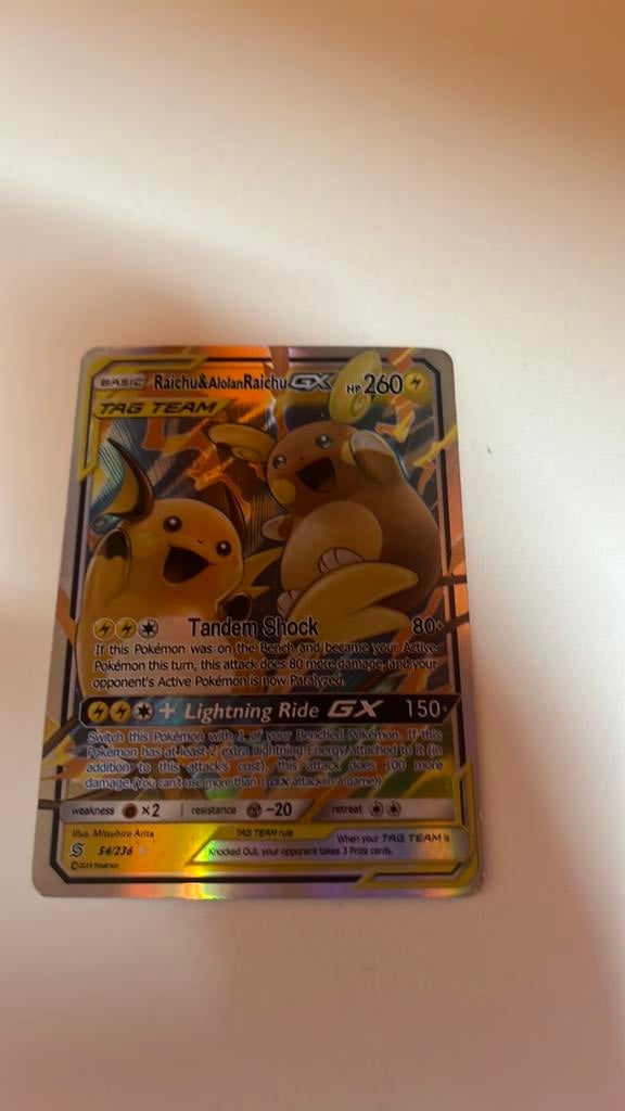 Raichu & alolan raichu GX, Verzenden, Zo goed als nieuw, Losse kaart, Foil