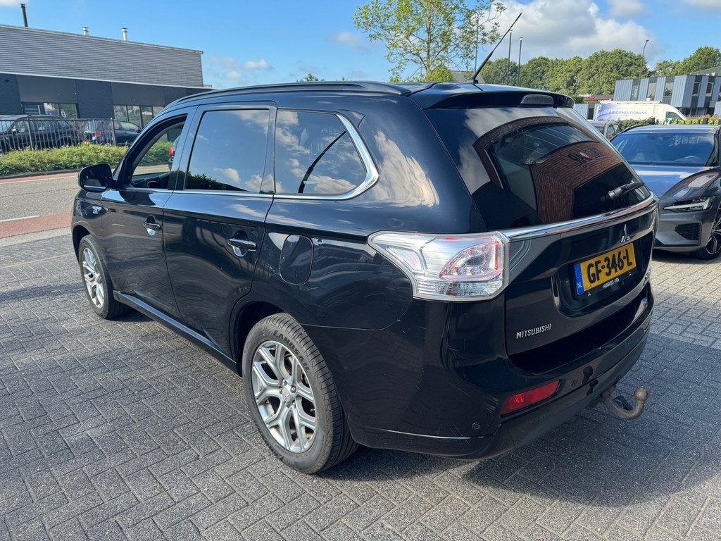Mitsubishi Outlander 2.0 PHEV Business XENON CAMERA CRUISE T, Auto's, Mitsubishi, 4 cilinders, Zwart, Vierwielaandrijving, Hybride Elektrisch/Benzine