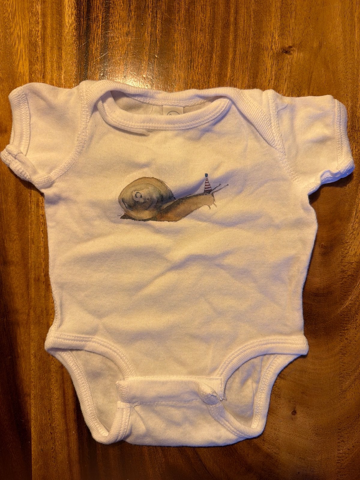 Schattige romper met slakkenprint - Dunne stof, Newborn, Ophalen of Verzenden, Zo goed als nieuw, Jongetje of Meisje