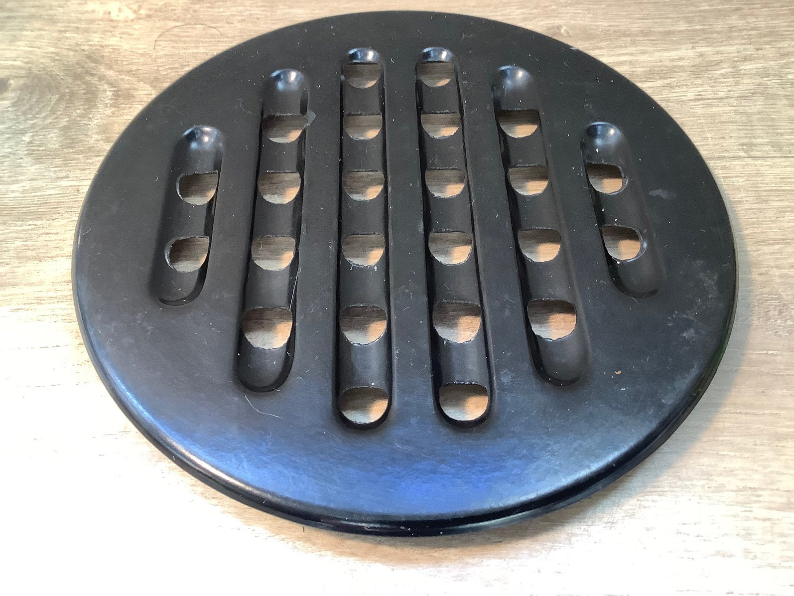 Antieke onderzetter pannenonderzetter bakeliet, Ophalen of Verzenden