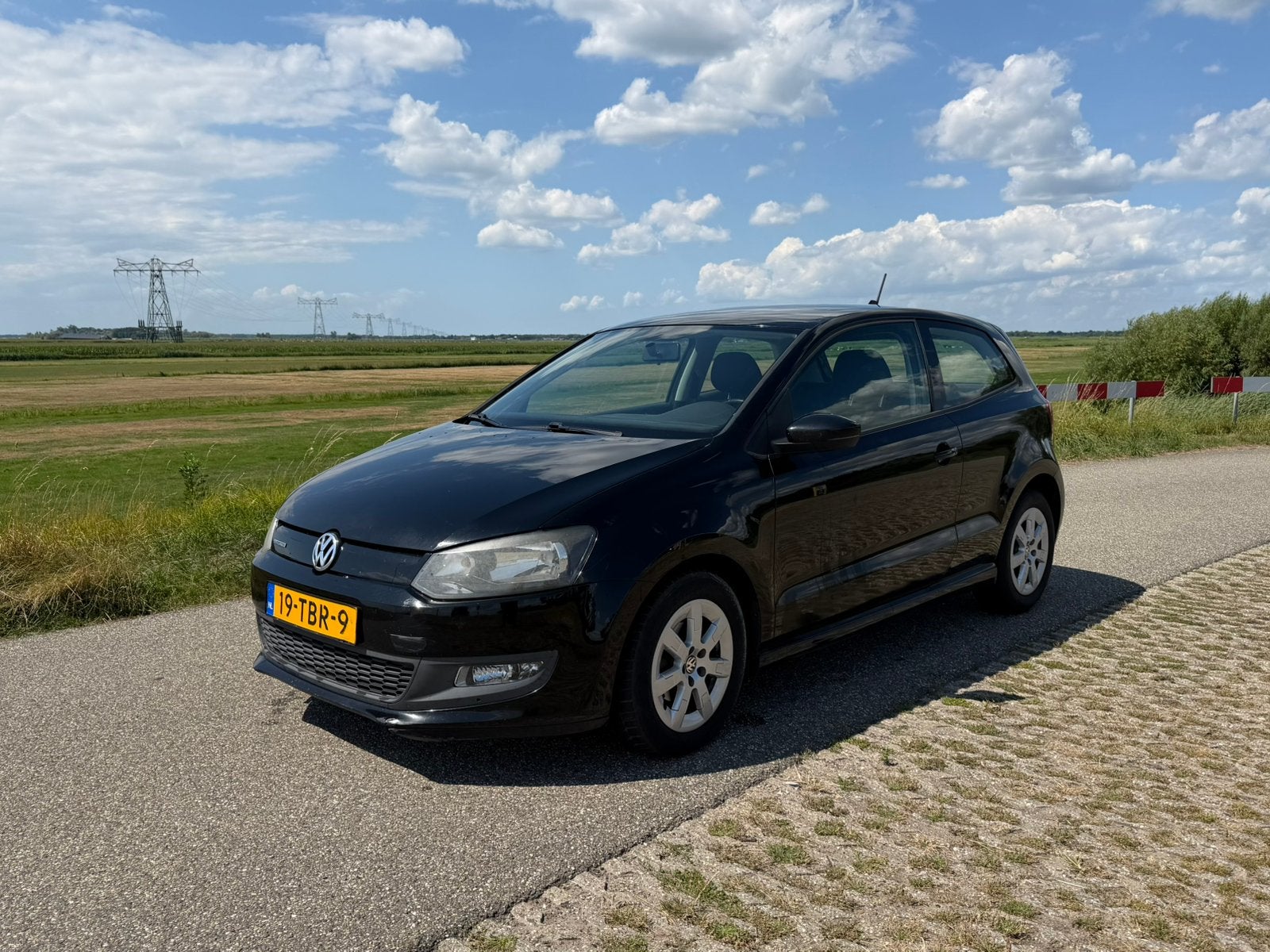 Volkswagen Polo 1.2 TDI 55KW BM 2012 Zwart, Voorwielaandrijving, Stof, 74 pk, 96 €/maand