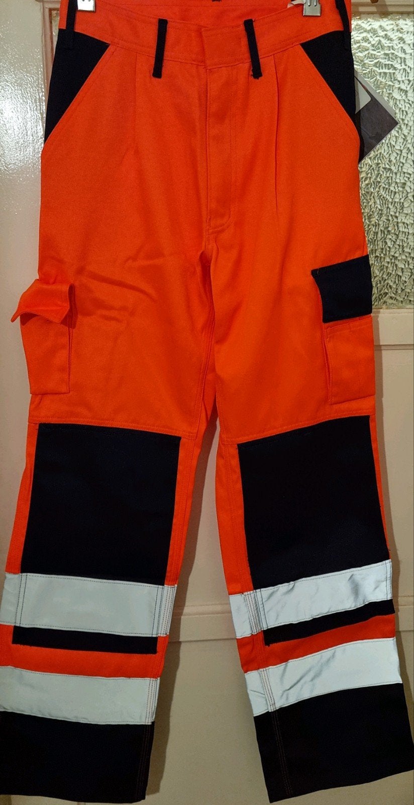 Format oranje reflecterende werkbroek maat 44 en 62, Ophalen, Format, Nieuw, Kinderen