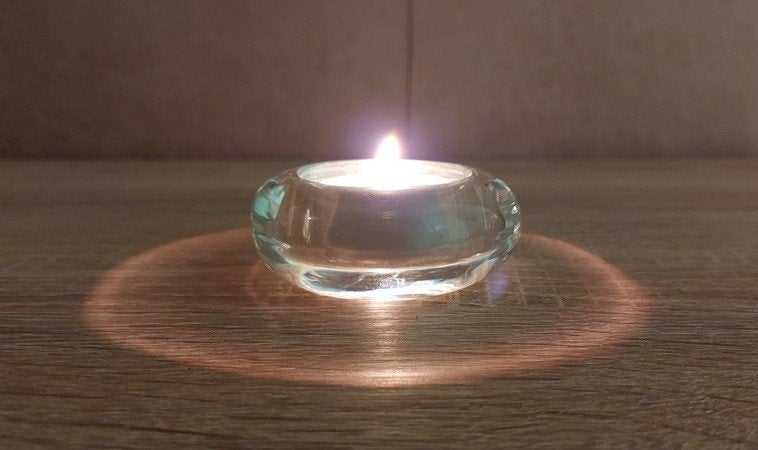 Waxinelicht houder uit glas. Prijs bieden, Overige merken, Waxinelichthouder, Ophalen of Verzenden, 5 cm