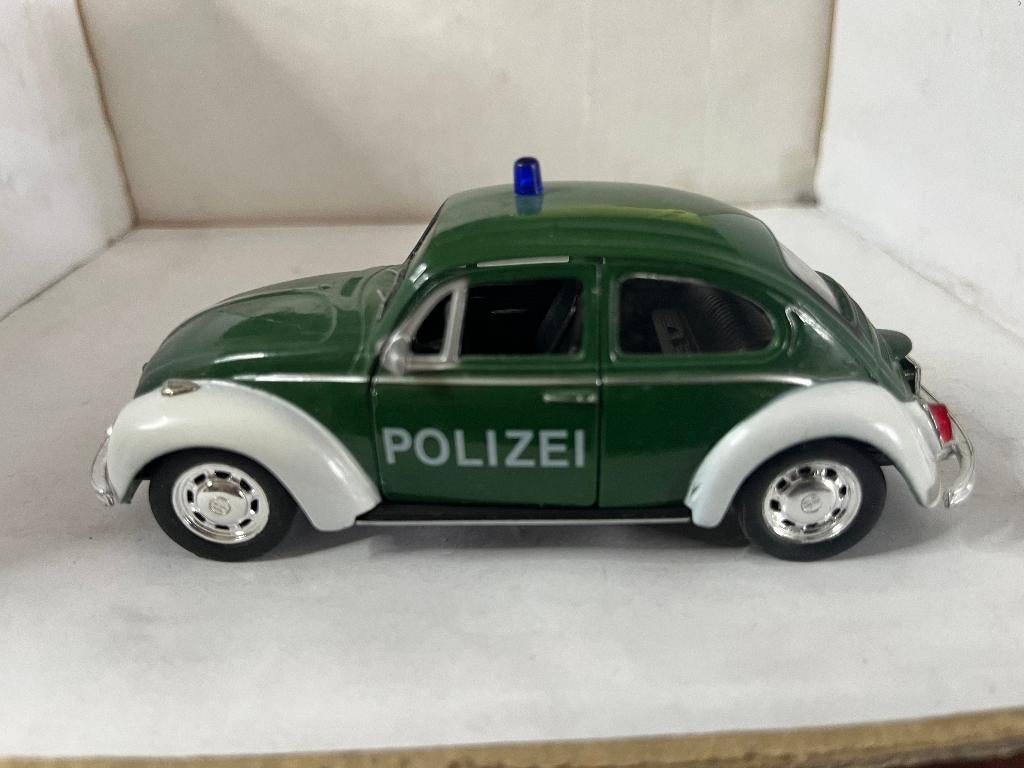 VW Kever Politie., Hobby en Vrije tijd, Modelauto's | Overige schalen, Ophalen of Verzenden, Zo goed als nieuw, Auto