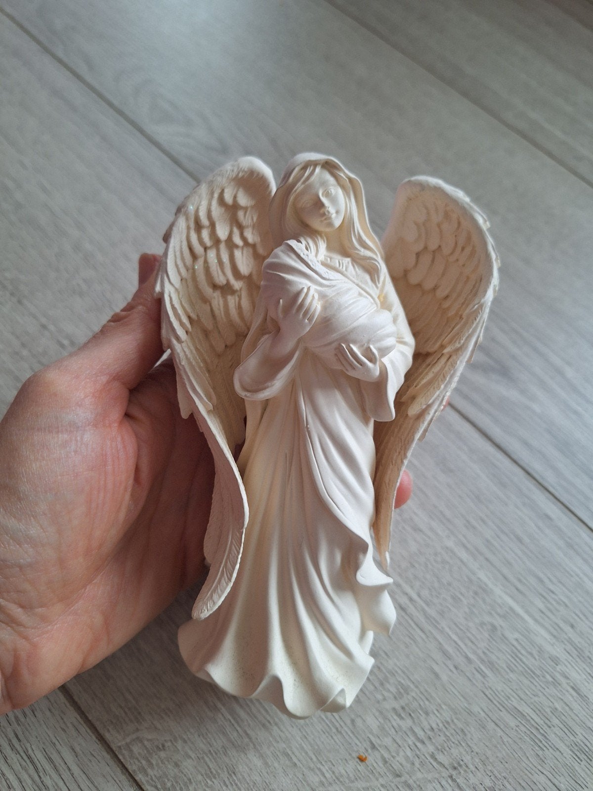 Angel Maria beeld, Ophalen
