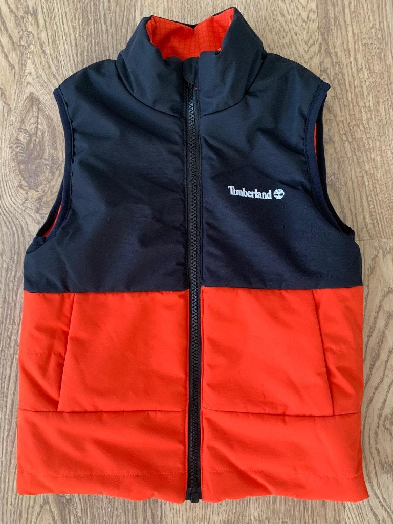 Timberland omkeerbare bodywarmer maat 116, Timberland, Jongen of Meisje, Ophalen of Verzenden, Zo goed als nieuw