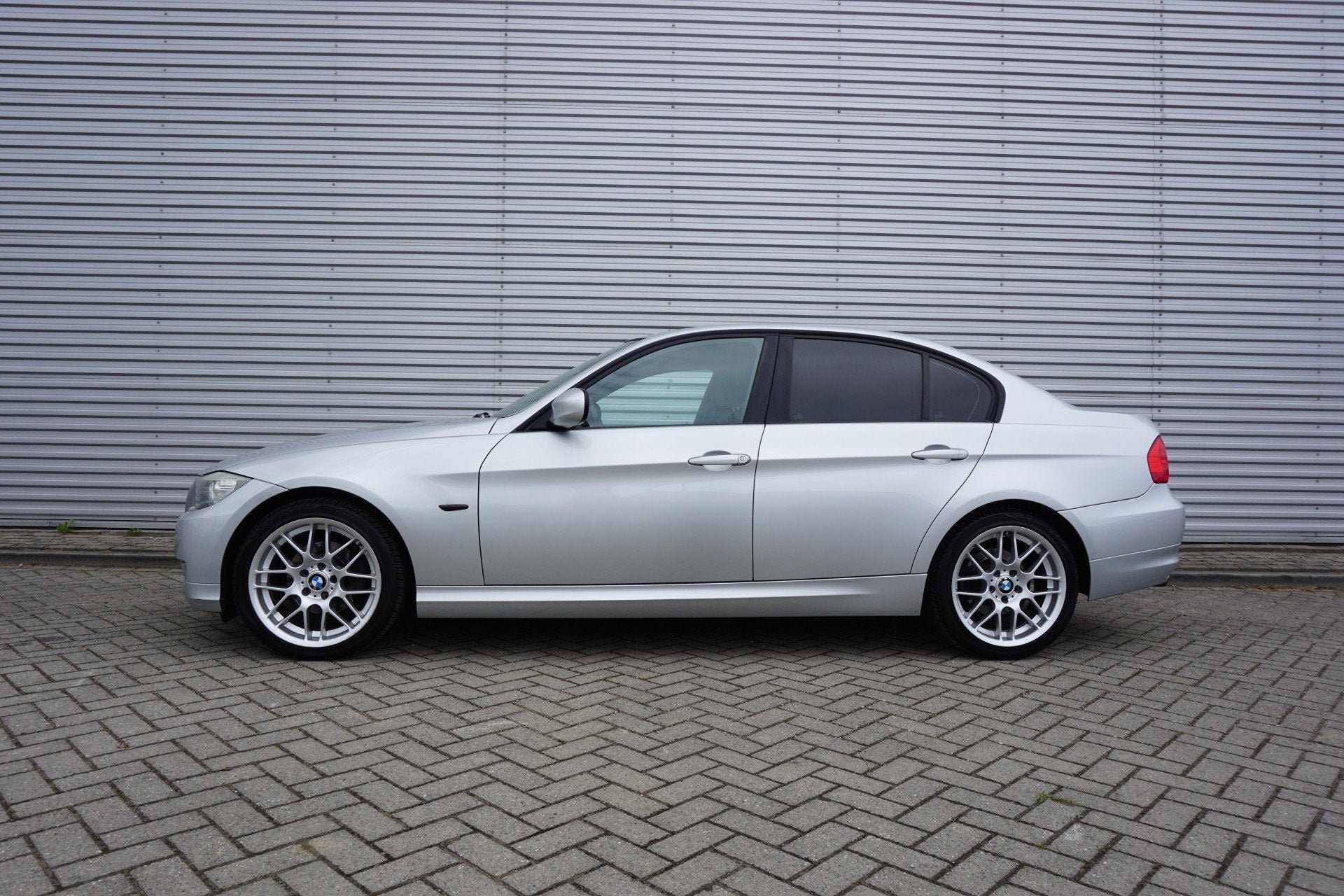 BMW 3-serie 316i Business Line Airco / Navi / Cruise / Carpl, Auto's, Euro 5, Gebruikt, 1599 cc, 4 cilinders