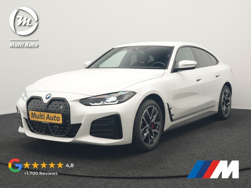 BMW i4 eDrive35 M Sport PRO 70 kWh 286pk Dealer O.H | Trekha, Auto's, BMW, Achterwielaandrijving, Gebruikt, Zwart, Wit