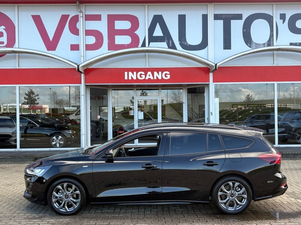Ford FOCUS WAGON 1.0 ECOBOOST HYBRID ST-LINE 155PK AUT. NAVI, Gebruikt, Huisgarantie, Met garantie (alle), Zwart