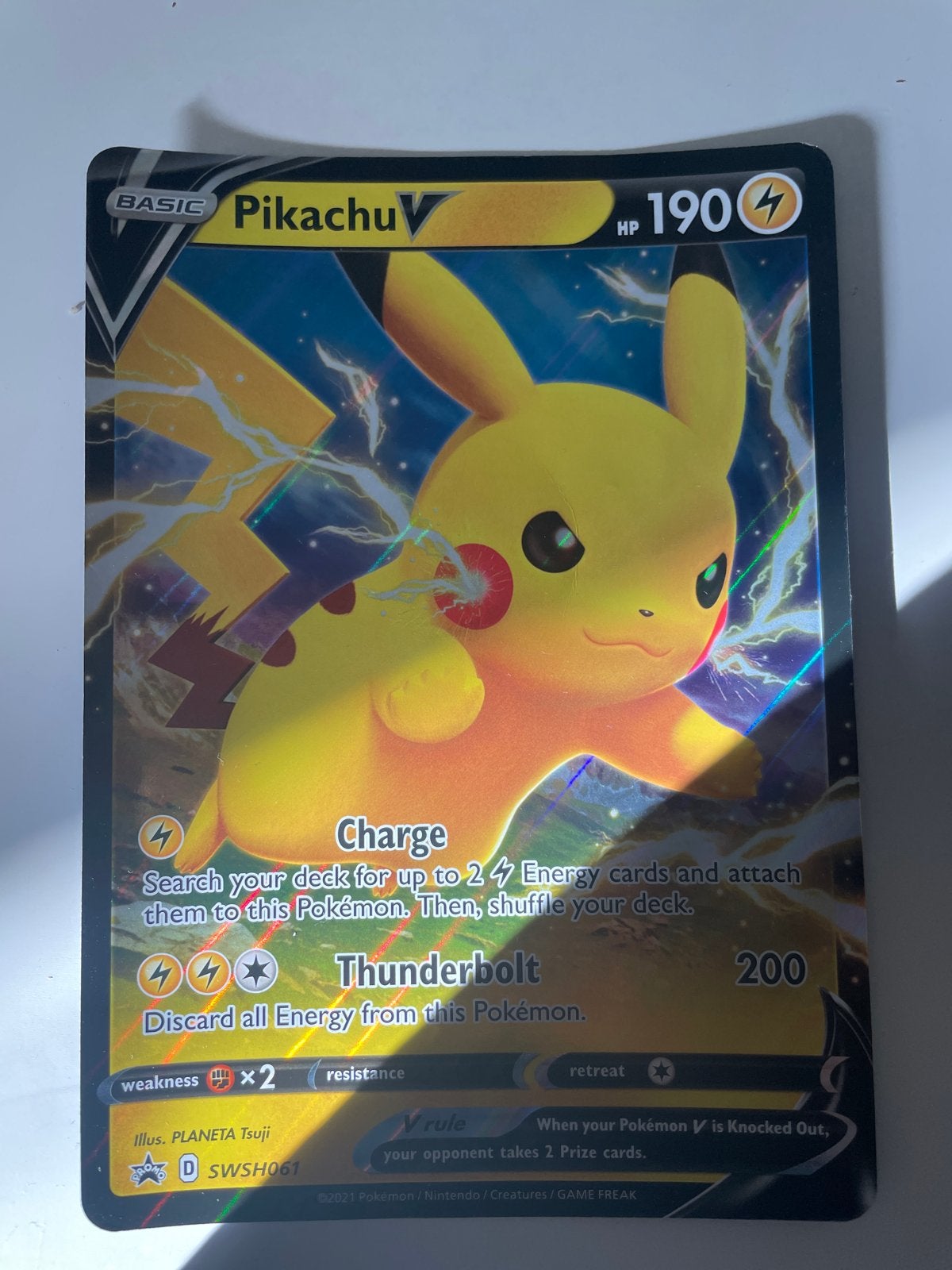 Pikachu V SWSH061 Pokémon Kaart, Ophalen, Zo goed als nieuw, Losse kaart