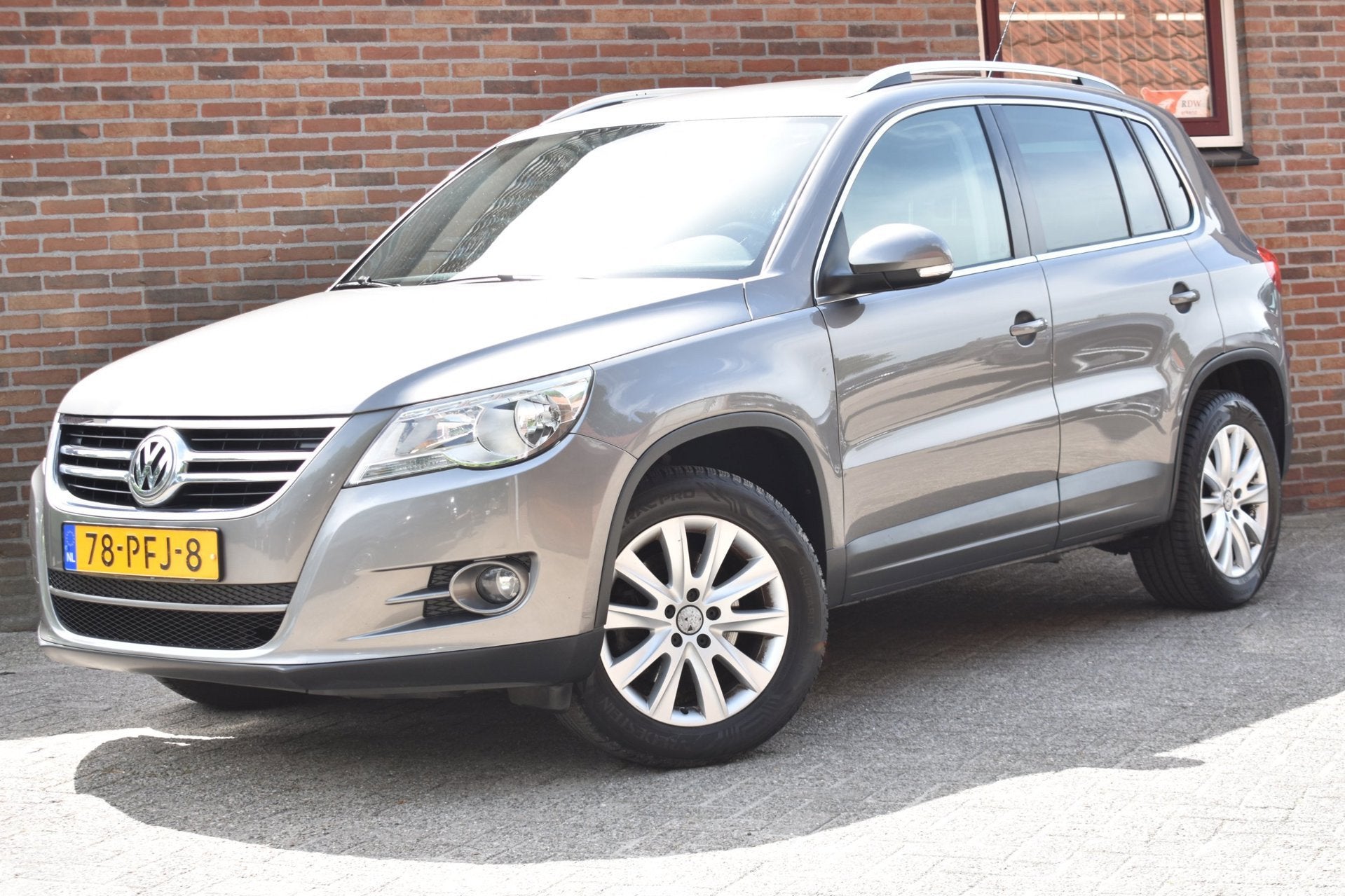 Volkswagen Tiguan 1.4 TSI Sport&Style '11 Clima Cruise Inrui, Voorwielaandrijving, Euro 5, Gebruikt, Zwart
