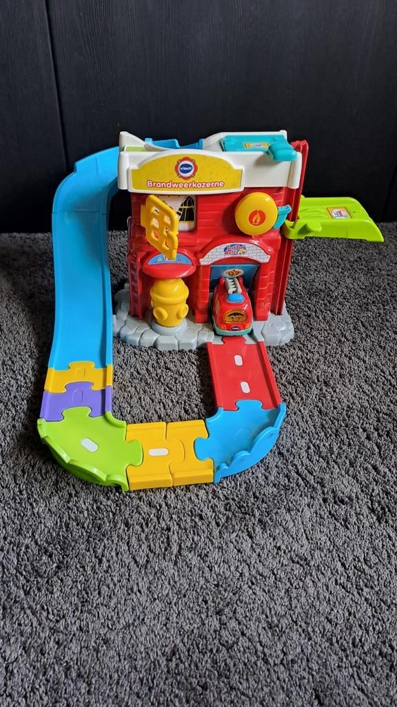 VTech Toet Toet Brandweerkazerne met brandweerauto, Ophalen of Verzenden, Gebruikt, Auto, Met wieltjes