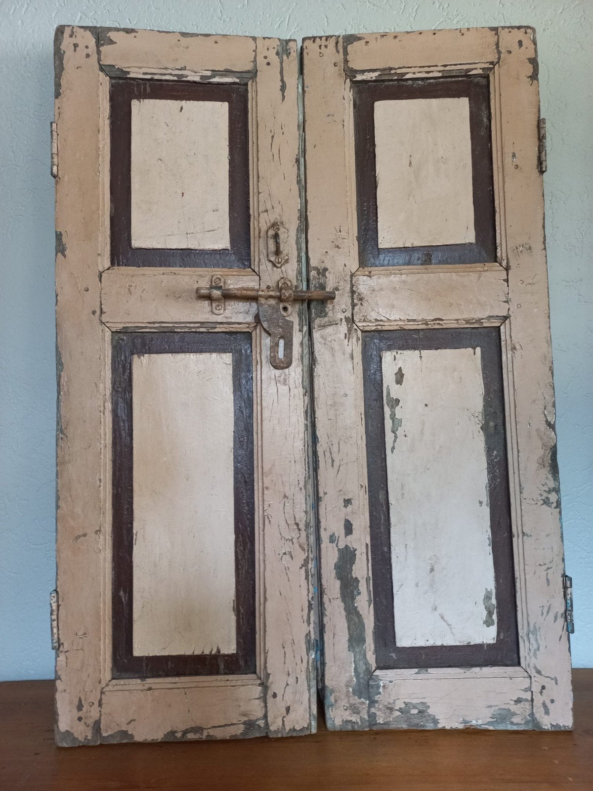 Antieke houten luiken, Ophalen