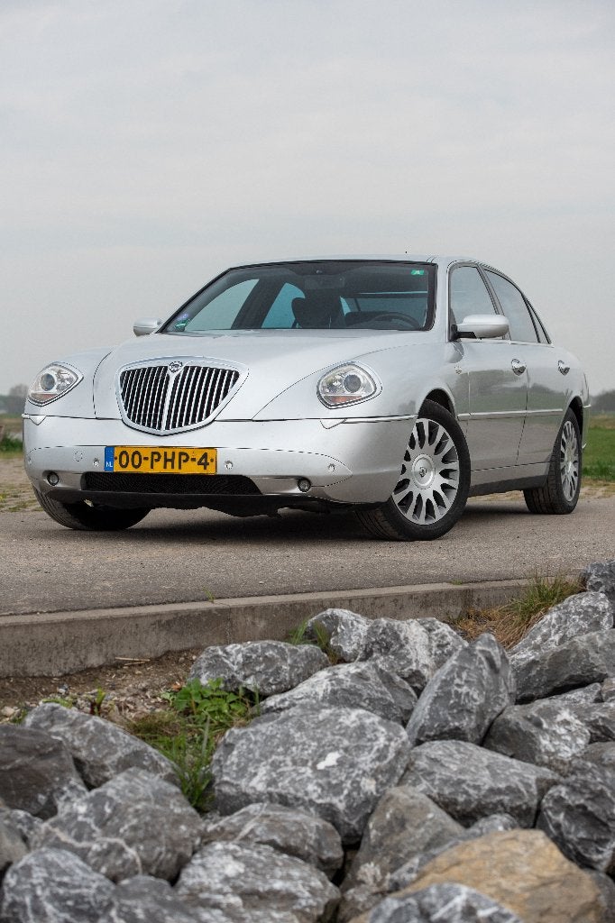 Lancia Thesis 3.0 V6 LPG, Zwart, Navigatiesysteem, 96 €/maand, Dealer onderhouden