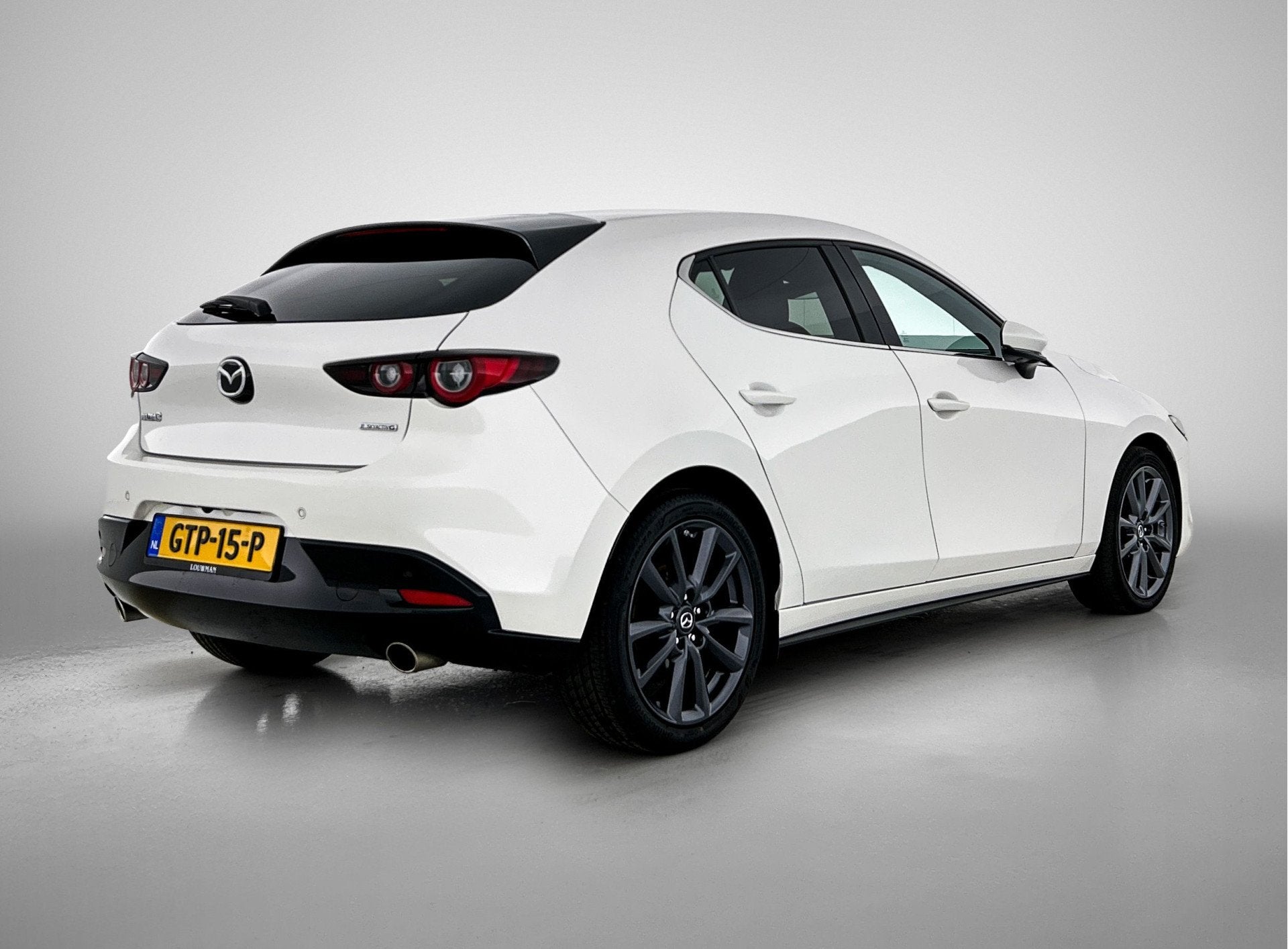 Mazda 3 2.0 e-SkyActiv-G M Hybrid 122 Exclusive-line | Stuur, 12 maanden, Stof, Gebruikt, 4 cilinders