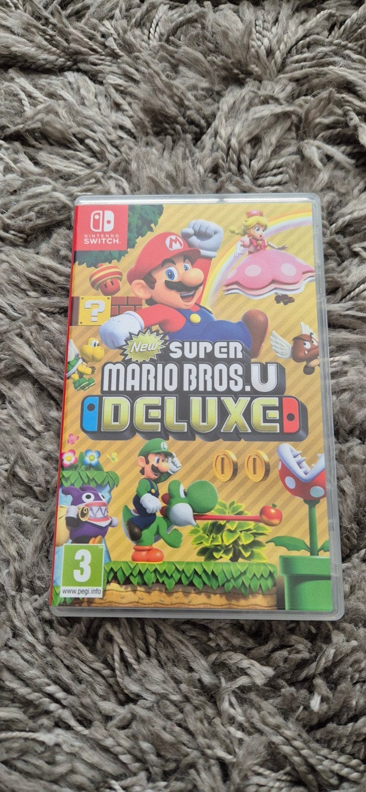 New Super Mario Bros. U Deluxe - Nintendo Switch, Spelcomputers en Games, Eén computer, Ophalen of Verzenden, Zo goed als nieuw