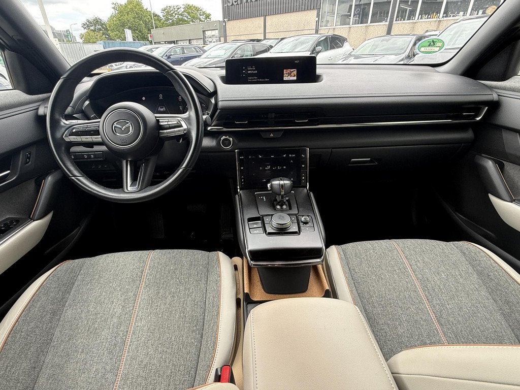 Mazda MX-30 e-SkyActiv 145 First Edition 36 kWh | 92,7% SOH, Auto's, Mazda, 145 pk, Stof, Gebruikt, Met garantie (alle)