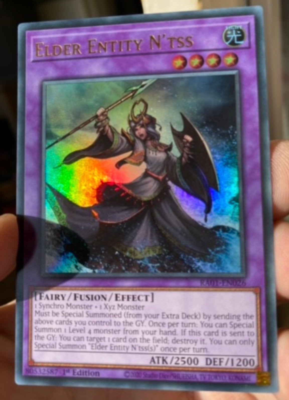Yu-Gi-Oh! Elder Entity N'tss RA01 1st Edition !, Ophalen of Verzenden, Zo goed als nieuw, Losse kaart, Foil