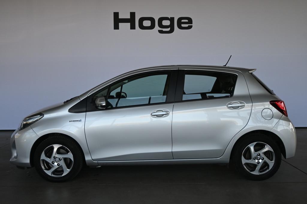 Toyota Yaris 1.5 Hybrid Clima Cruise control Navigatie Camer, Gebruikt, 4 cilinders, Met garantie (alle), 49 €/maand