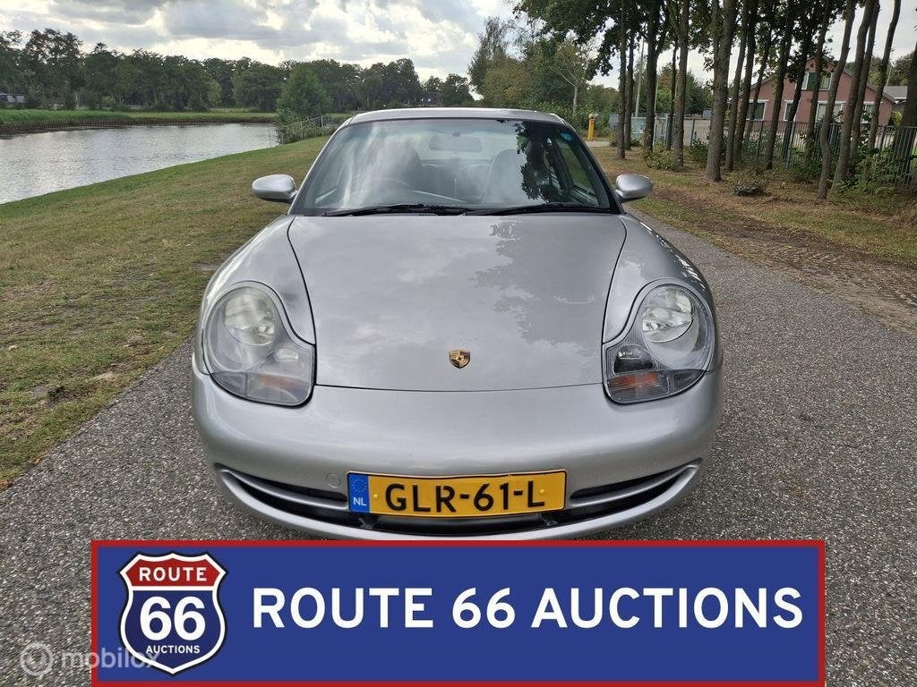 Porsche 911 Carrera | 1998 | Route 66 Auctions, Auto's, Overige carrosserieën, Zwart, Bedrijf, Porsche
