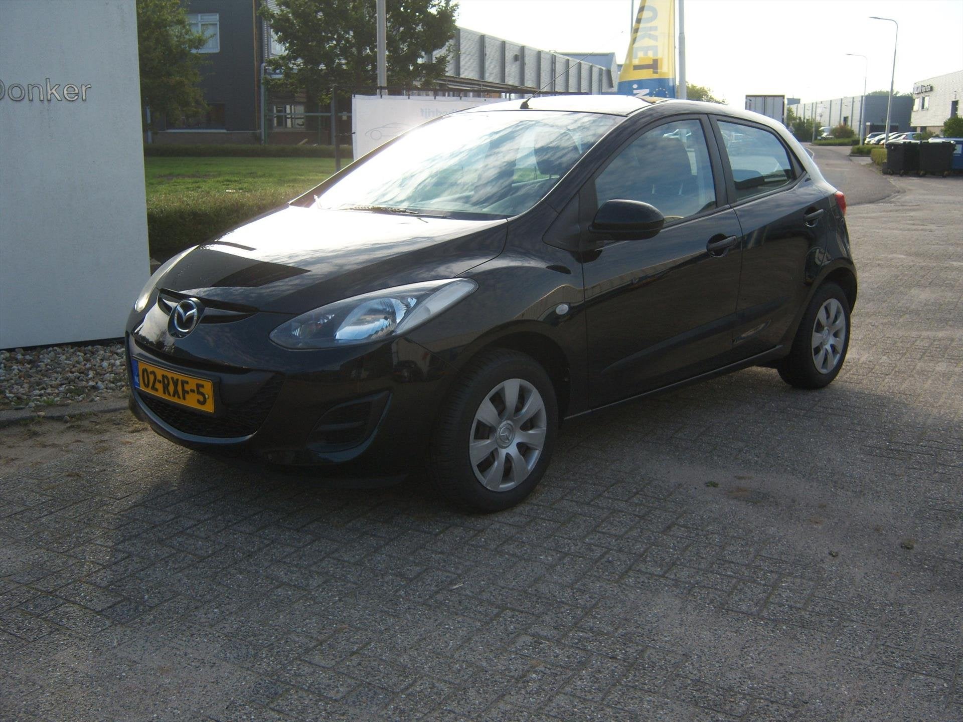 MAZDA 2 1.3 75pk 5D BiFuel Cool LPG Trekhaak, Auto's, Dealer onderhouden, Gebruikt, 4 cilinders, Zwart