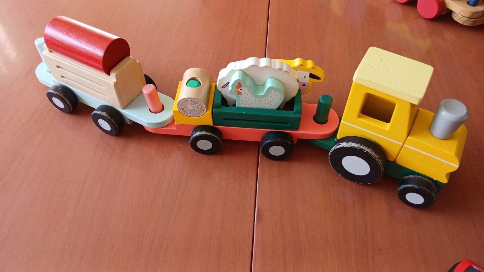 Houte speelgoed tractor, Ophalen