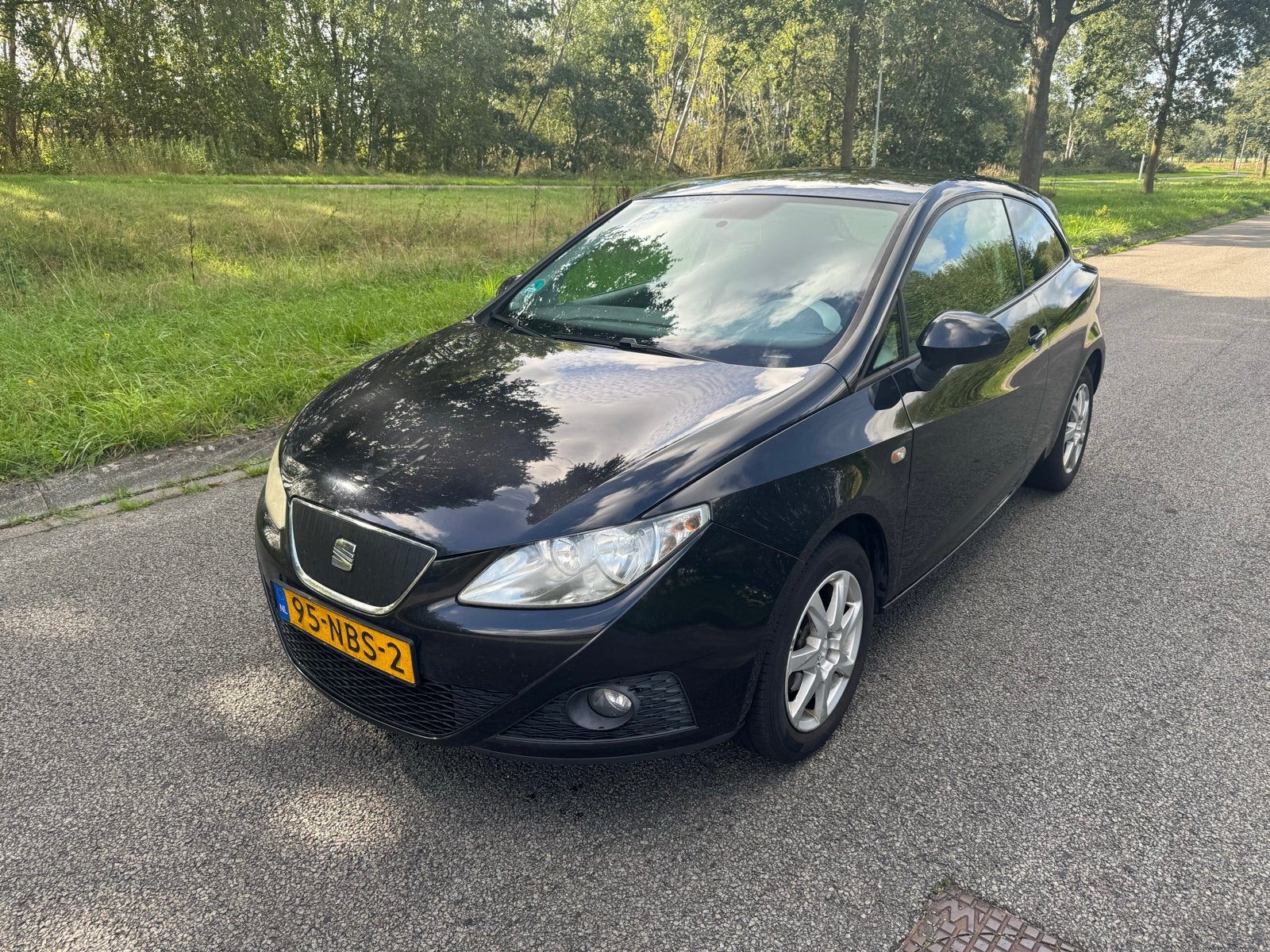 Seat Ibiza 1.2 TDI 55KW Ecomotive 2010 Zwart, Auto's, Voorwielaandrijving, Stof, Zwart, 1199 cc