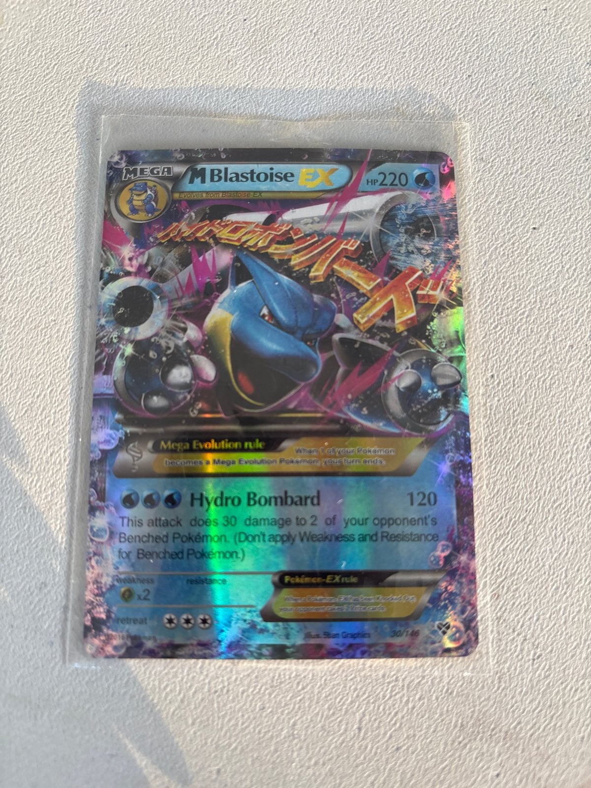 Mega Blastoise EX Pokémon Kaart - Holo Foil, Ophalen of Verzenden, Zo goed als nieuw, Losse kaart, Foil