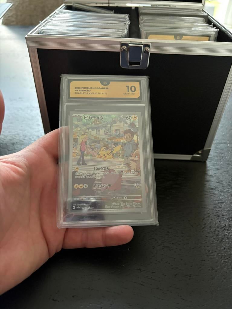 Pikachu 151 grade 10, Ophalen of Verzenden, Zo goed als nieuw, Meerdere kaarten, Foil