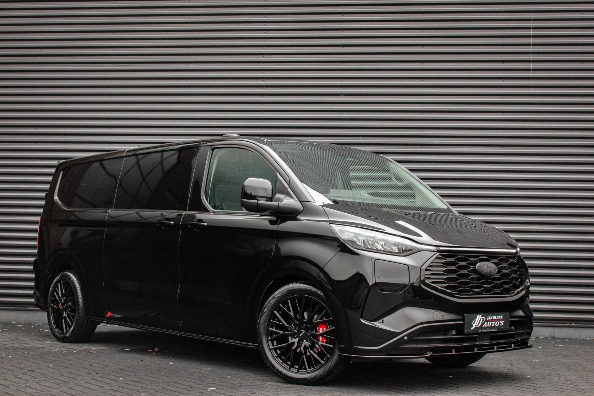 Ford E-Transit Cust. 340 L2H1 Limited 71 kWh 218PK / JB-EDIT, Automaat, Dealer onderhouden, Achterwielaandrijving, Zwart