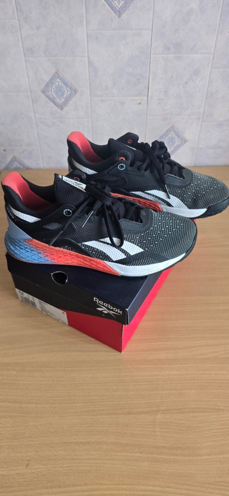 Nieuwe Reebok Nano X Sportschoenen - Zwart/Oranje/Blauw, Fitness, Maat 48/50 (M), Zwart, Ophalen of Verzenden