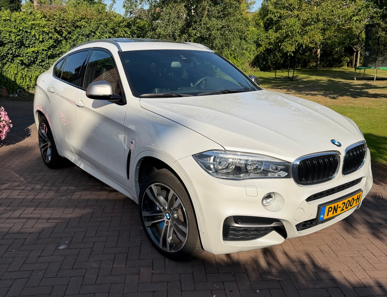 BMW X6 M50d 381pk Aut. 2017 Wit 125874 km, Automaat, Lichtsensor, 2993 cc, Wit
