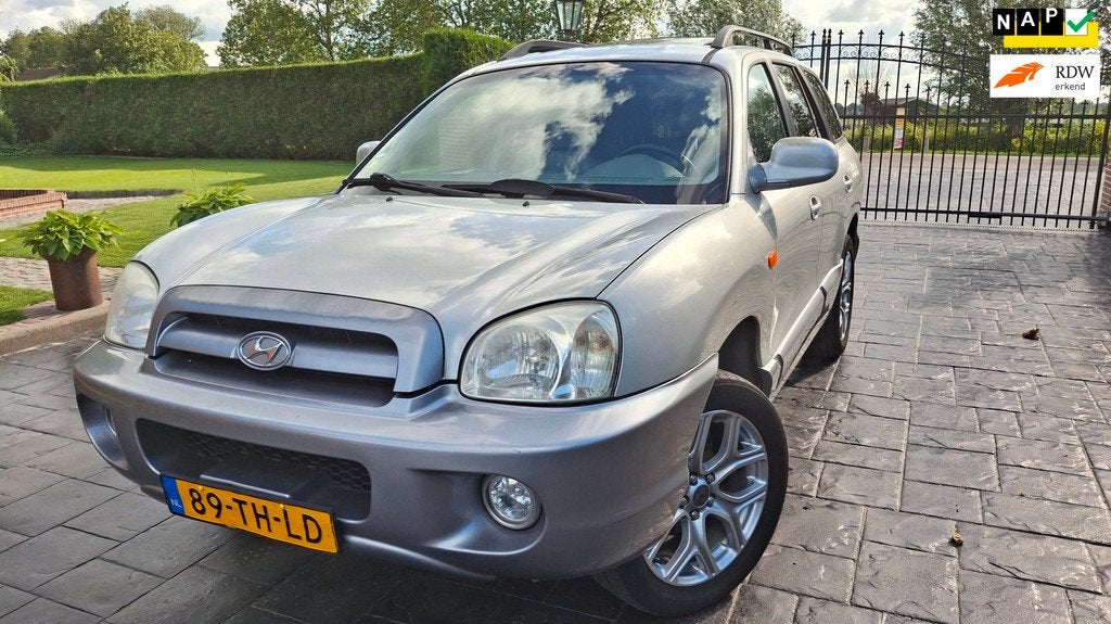 Hyundai Santa Fe 2.4i-16V Elite Airco Leder Dakraam CV Inrui, Auto's, Hyundai, Voorwielaandrijving, Santa Fe, Gebruikt, 2000 kg