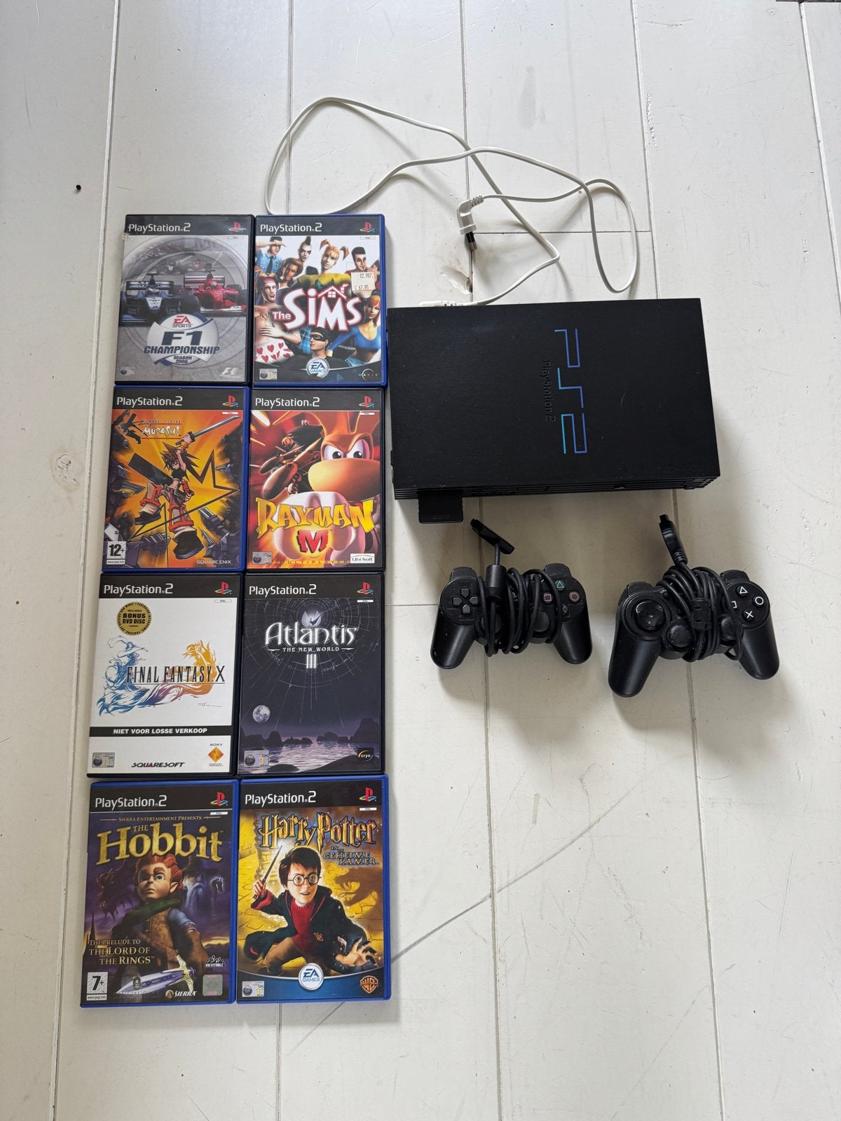 PlayStation 2 Phat met 2 controllers en 8 games, Spelcomputers en Games, Spelcomputers | Sony PlayStation 2, Met 2 controllers