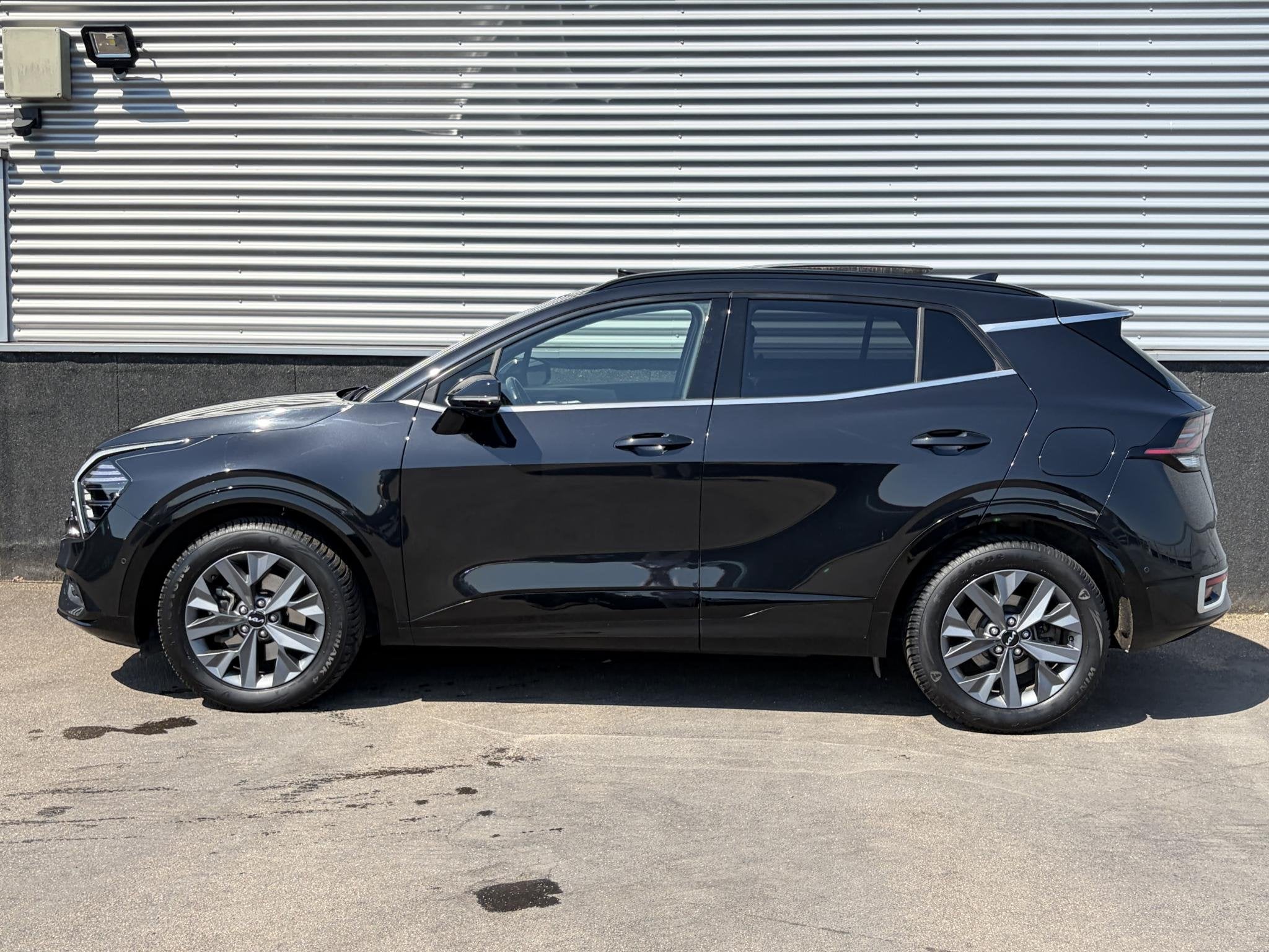 Kia Sportage 1.6 T-GDi Hybrid GT-Line Schuif/kanteldak, Stoe, Auto's, Kia, Gebruikt, Euro 6, 4 cilinders, Zwart