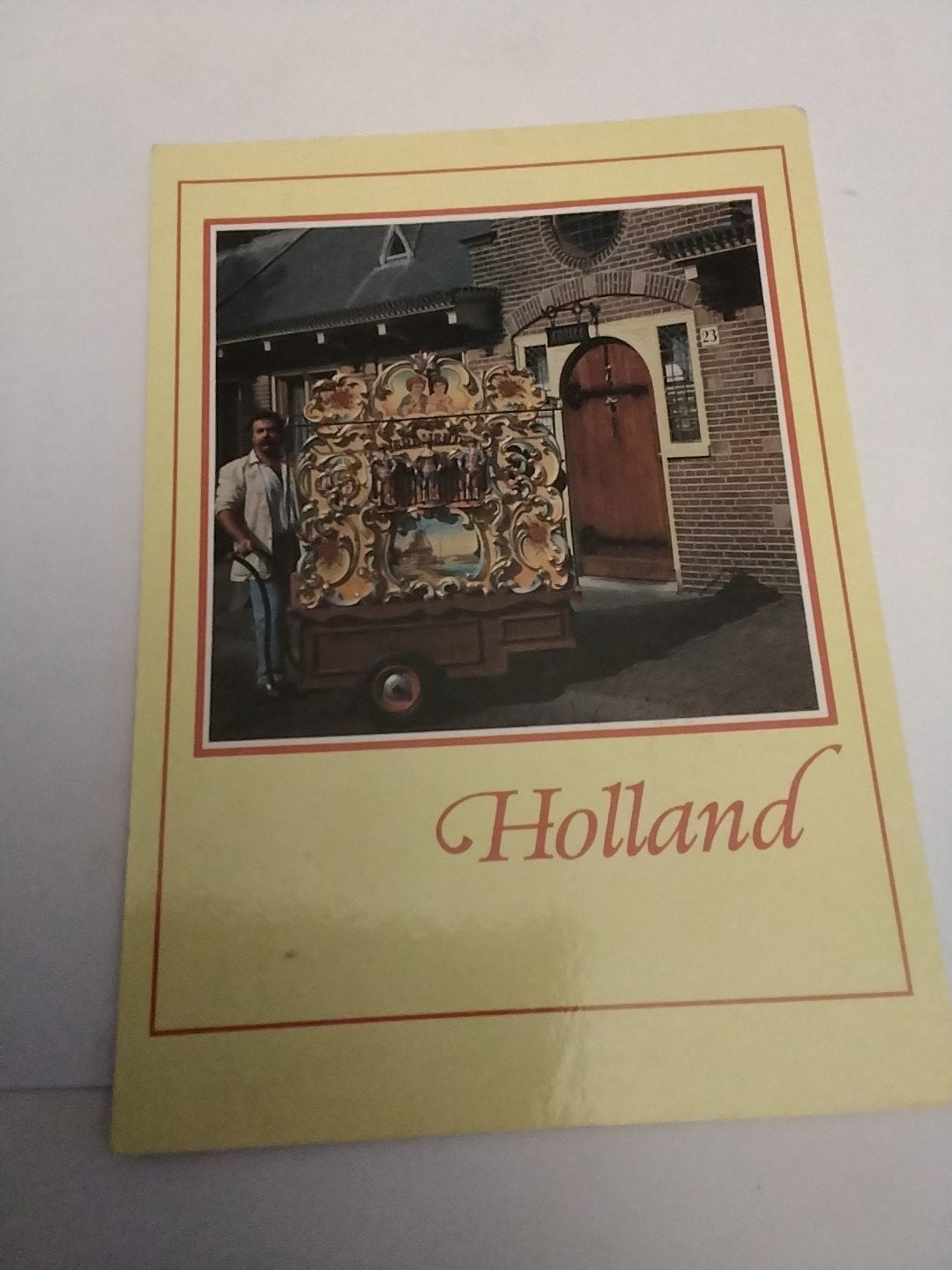 Oude ansichtkaart Holland met draaiorgel, Ophalen of Verzenden, 1980 tot heden, Gelopen
