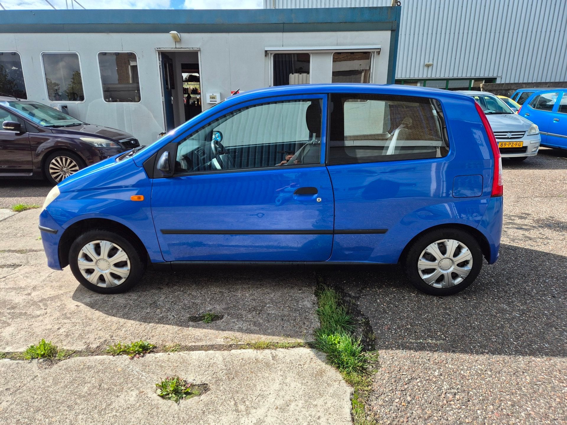 Daihatsu Cuore 1.0-12V 100th Anniversary, goed onderhouden/, Auto's, Stof, Zwart, 18 €/maand, Cuore